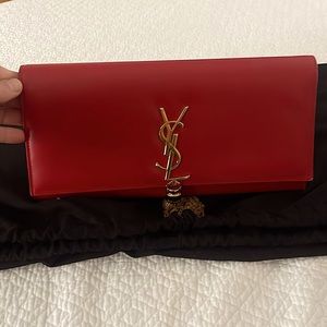 Red Yves Saint Laurent Leather Clutch